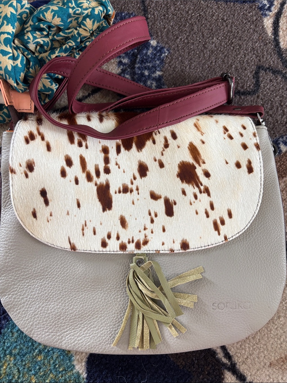 Soruka Brown and White Haircalf Saddle Bag with Burgundy Strap